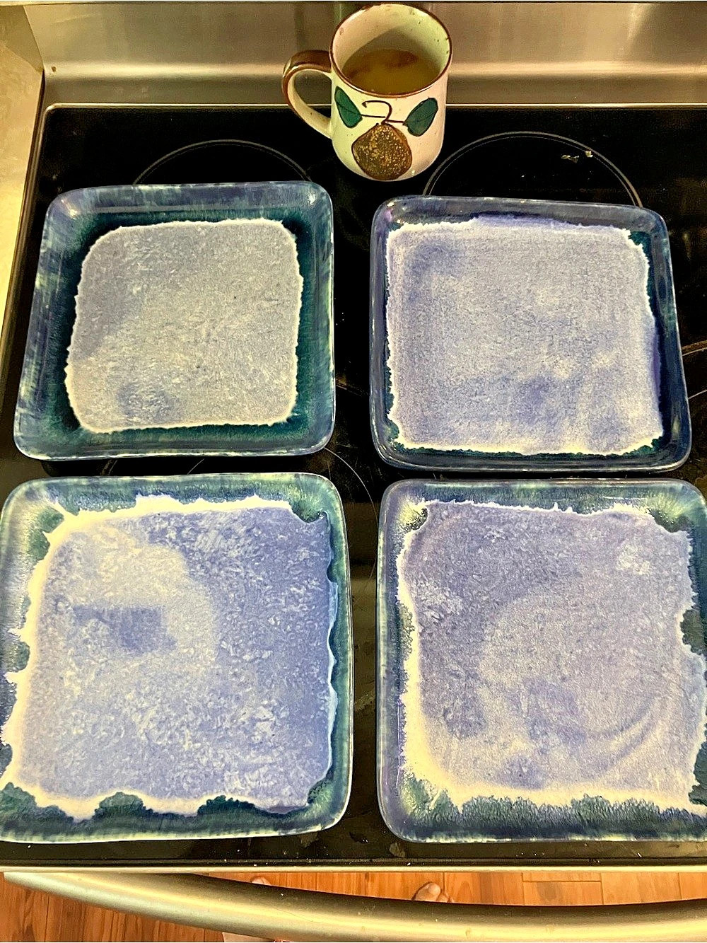 McCarty pottery blue with edge plate set